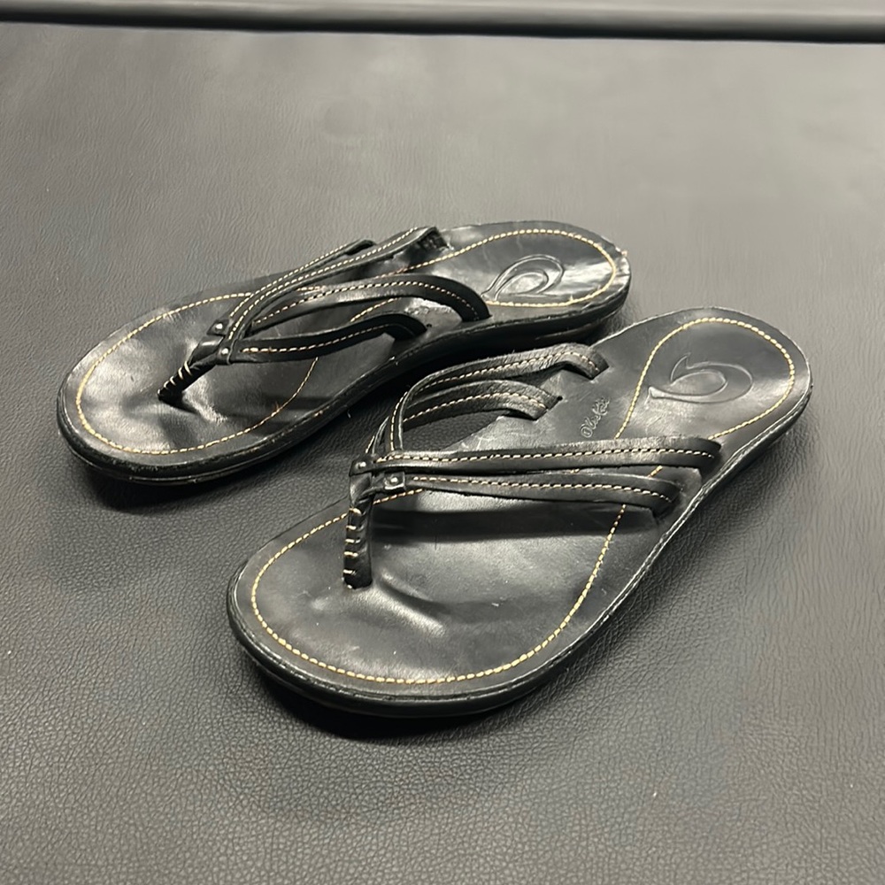 OluKai Black Leather Flip Flops